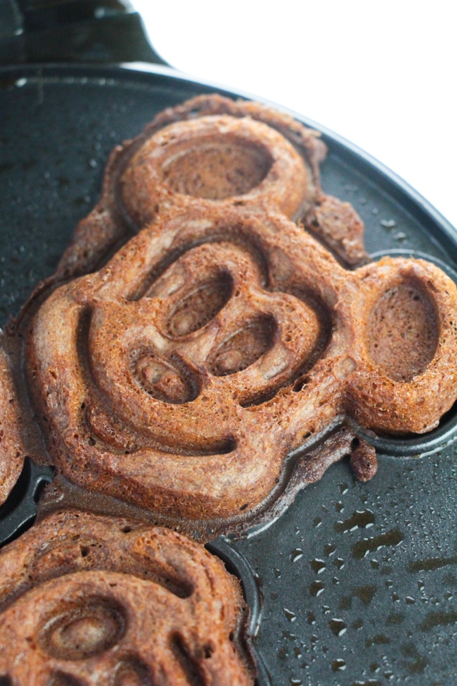 Chocolate Mickey Mouse Waffles 19 close up of cooked Mickey Mouse waffles in waffle maker