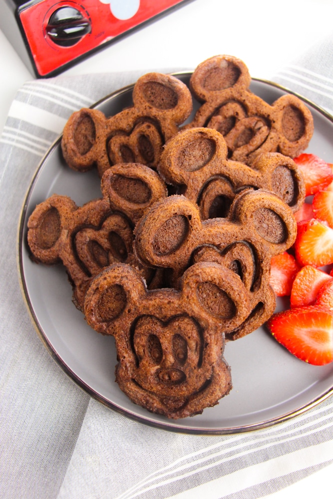 Chocolate Mickey Mouse Waffles 8 white plate of cooked Mickey Mouse waffles