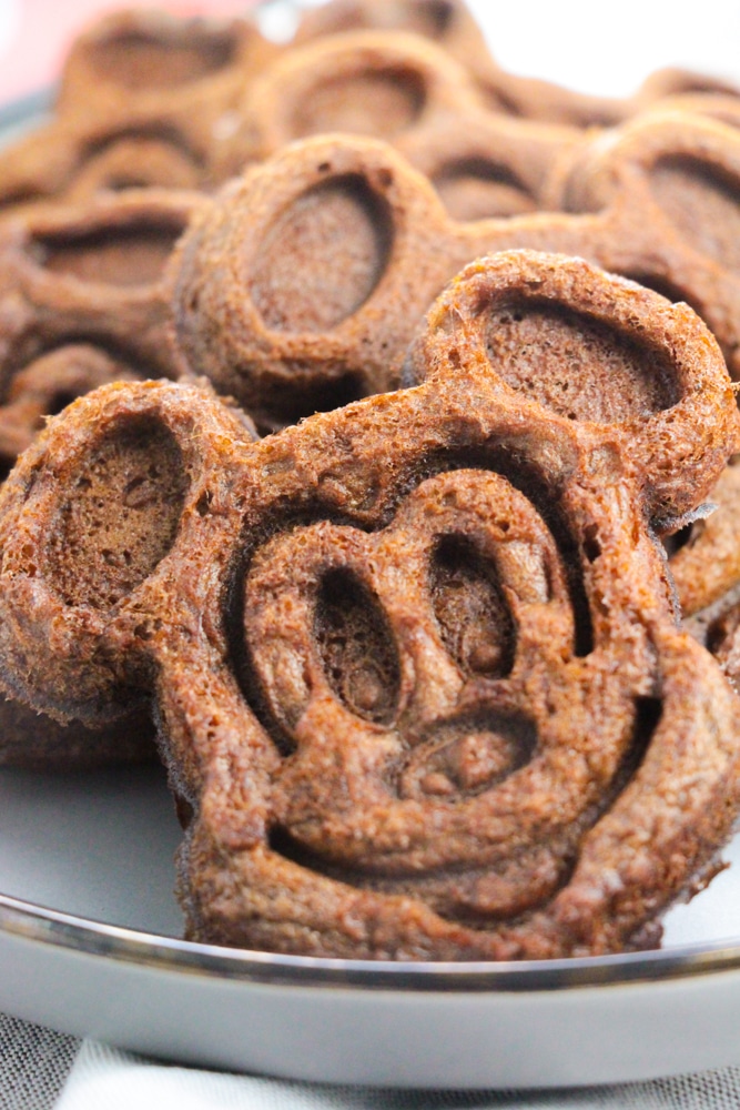 Chocolate Mickey Mouse Waffles 21 white plate of cooked Mickey Mouse waffles