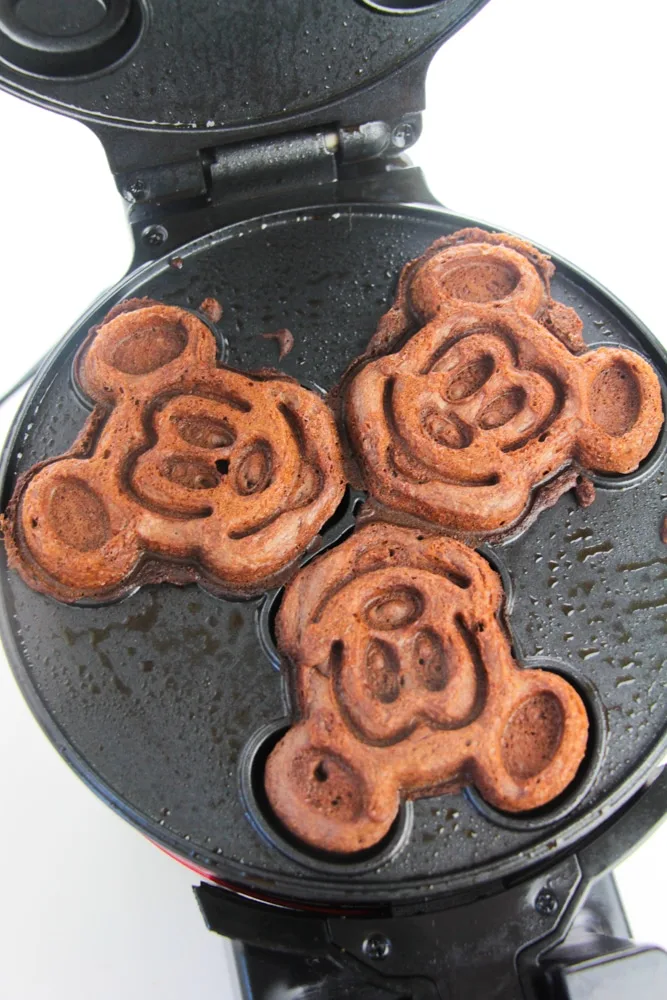 cooked Mickey Mouse waffles in waffle maker