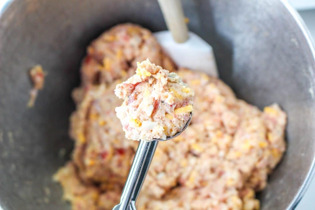 3 Ingredient Sausage Cheese Balls with Pimento Cheese 17 Pimento Cheese Sausage Balls mixture in silver ice cream scoop