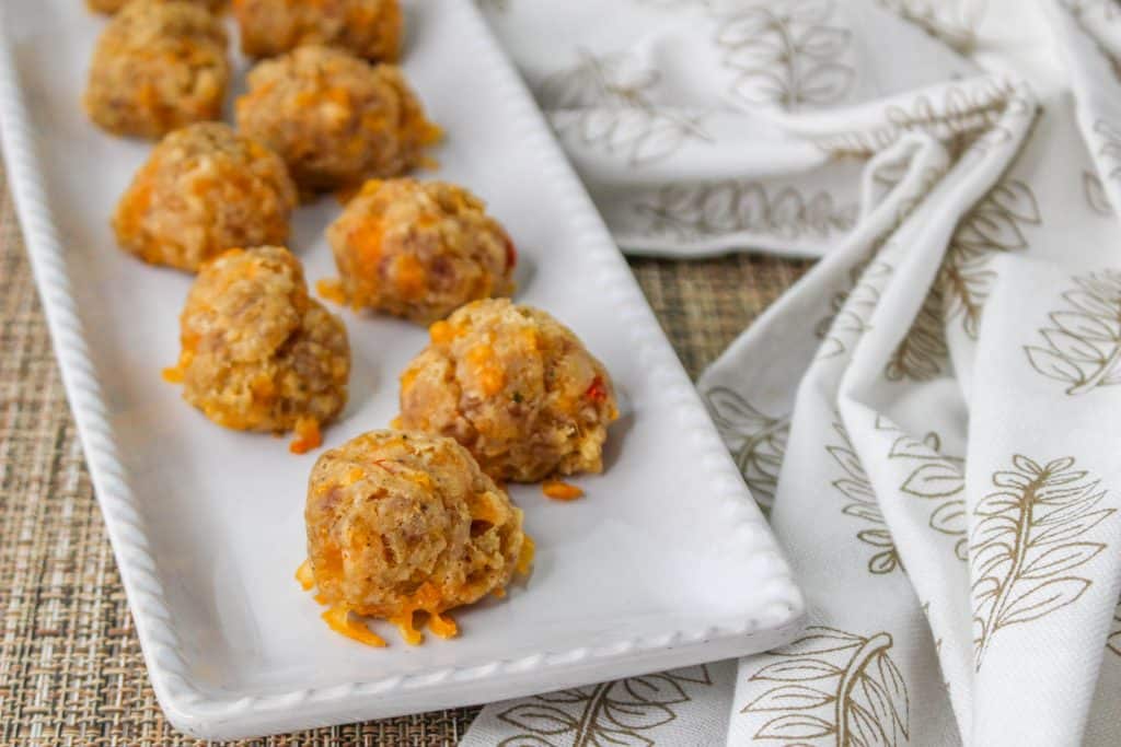 3 Ingredient Sausage Cheese Balls with Pimento Cheese 8 Pimento Cheese Sausage Balls on white rectangle serving tray