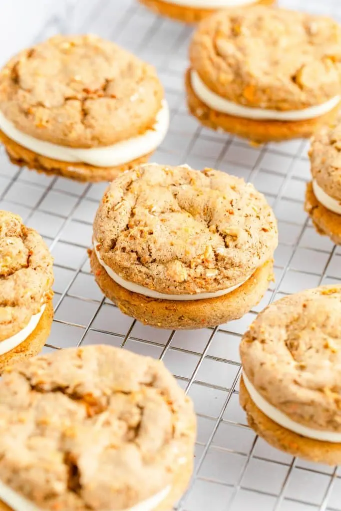 baked Carrot Cake Mix Cookie Sandwiches on wire cooling rack