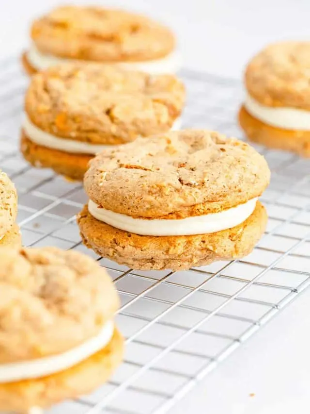 fully baked Carrot Cake Mix Cookie Sandwiches on wire cooling rack
