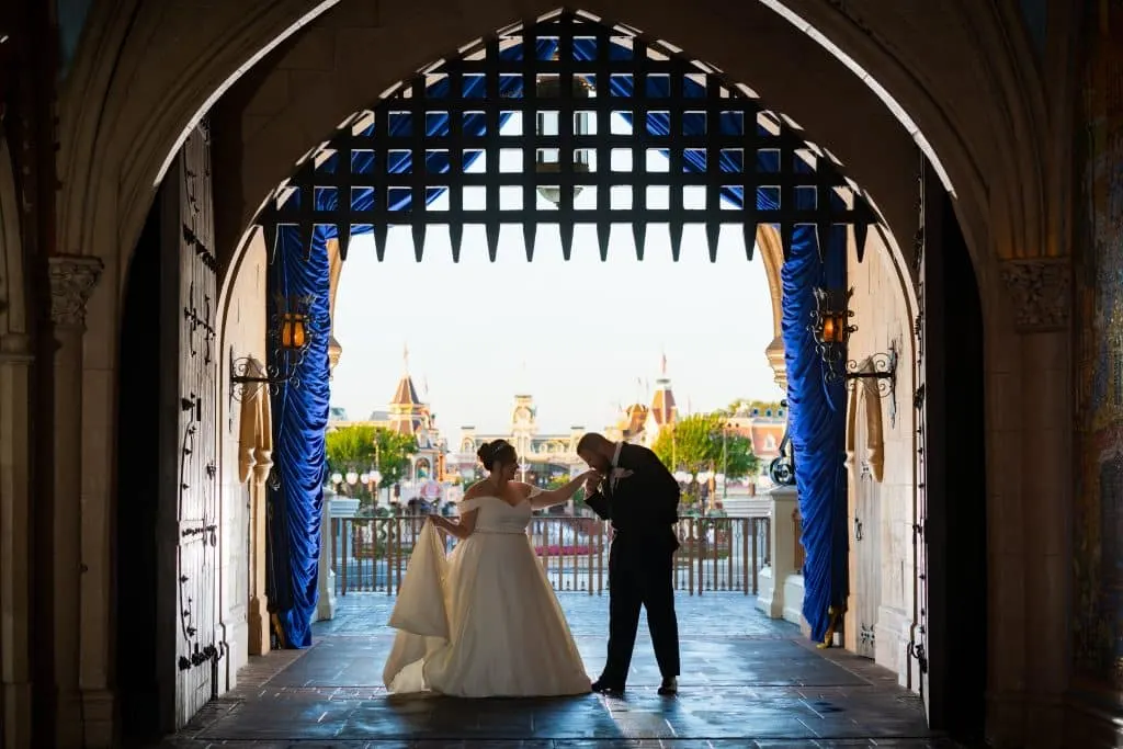 Everything You Need to Know About a Disney World Vow Renewal 5 bride and groom at Cinderella's Castle in Disney World