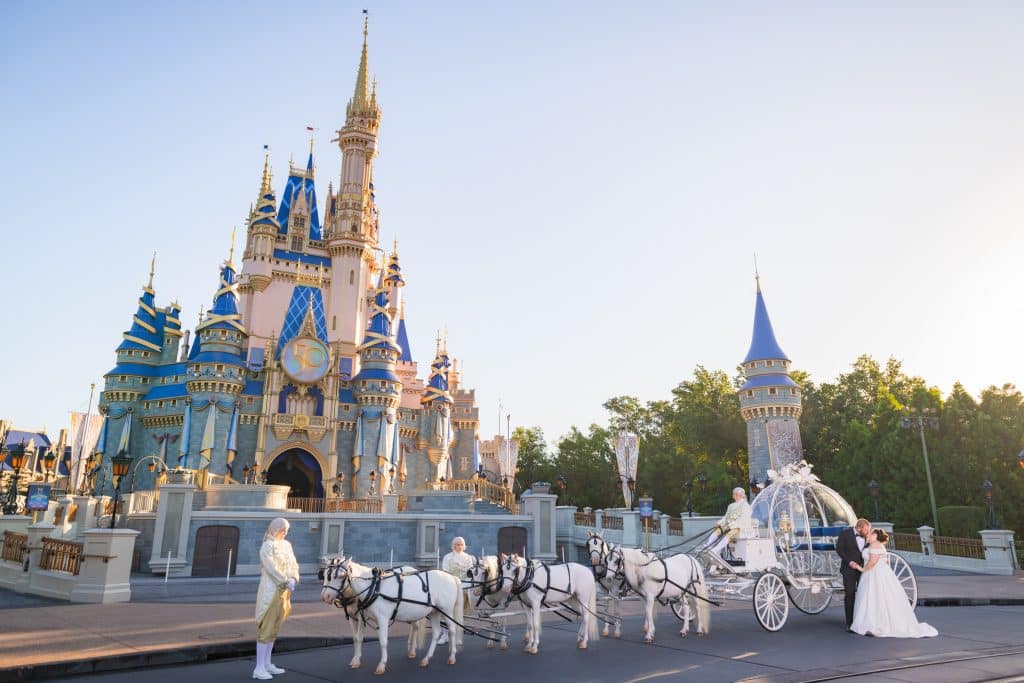 Everything You Need to Know About a Disney World Vow Renewal 51 Bride in Cinderella's Carriage at Disney World