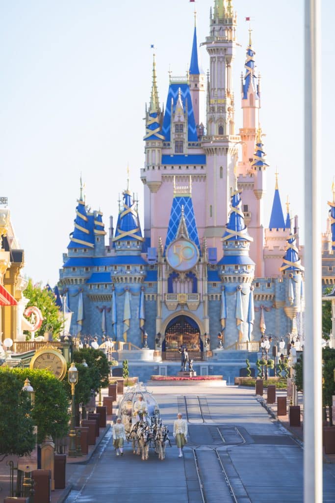 Everything You Need to Know About a Disney World Vow Renewal 50 Bride in Cinderella's Carriage at Disney World