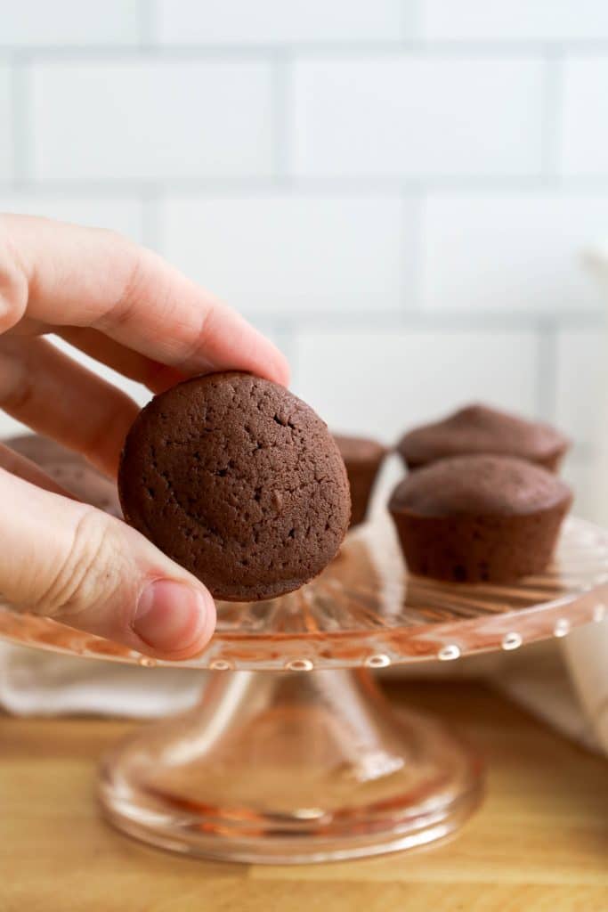 Easy Rolo Brownie Bites 7 person's hand holding a mini rolo brownie