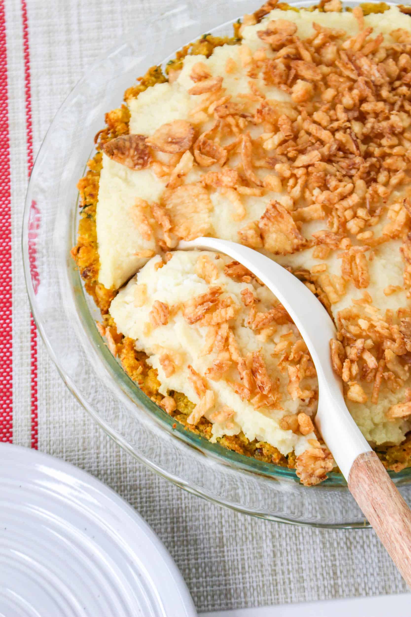 turkey pot pie with spoon in pie dish