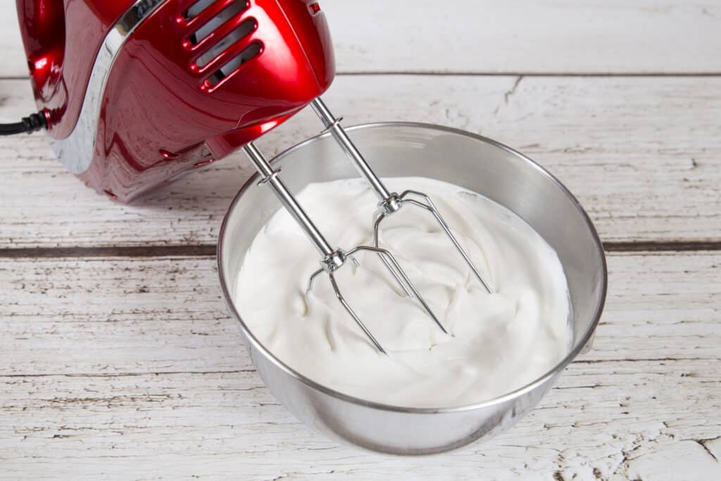 Strawberry Shortcake Biscuits with Refrigerated Biscuits 5 whipped cream in mixing bowl with mixer