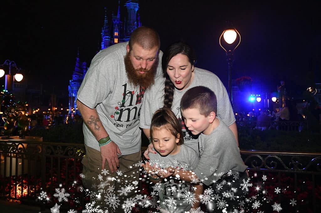 Mickey's Very Merry Christmas Party 2025: Everything You Need to Know 6 Family photo during Mickey's Very Merry Christmas Party.