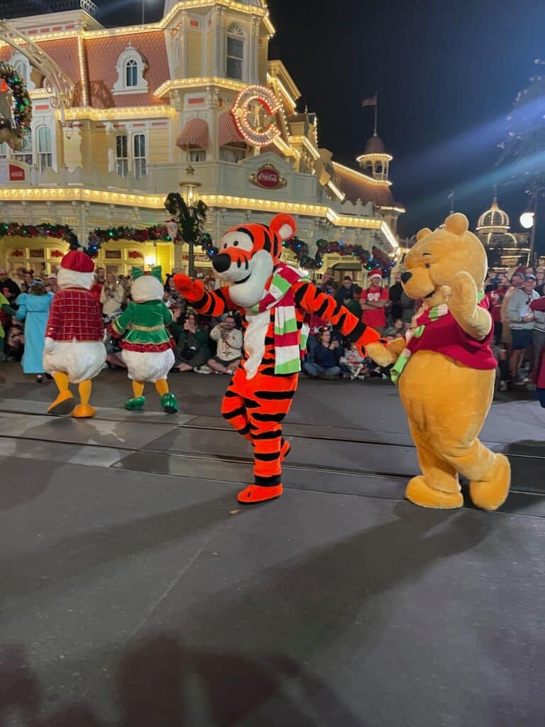 Mickey's Very Merry Christmas Party 2025: Everything You Need to Know 4 Winnie the Pooh and Tigger on Main Street USA.