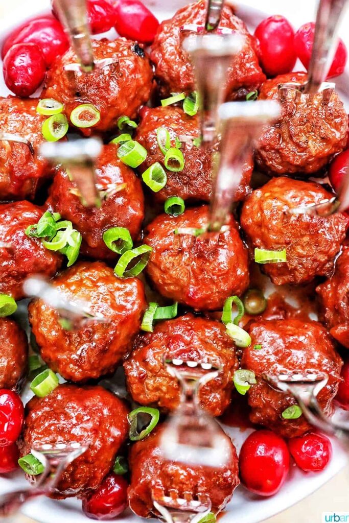 25 Christmas Appetizers That Travel Well 31 Close up of cranberry meatballs.