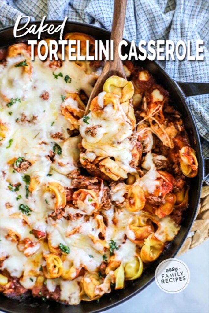 25 Venison Burger Casserole Recipes 13 Baked tortellini casserole with a wooden spoon.