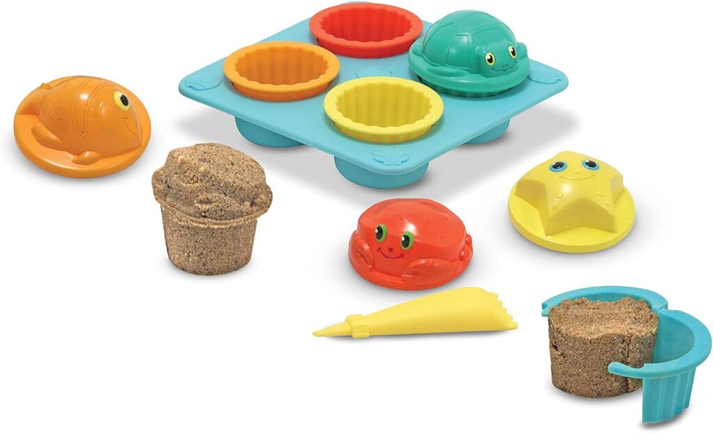 Melissa & Doug Sunny Patch Seaside Sidekicks Sand Cupcake Play Set against a white background.