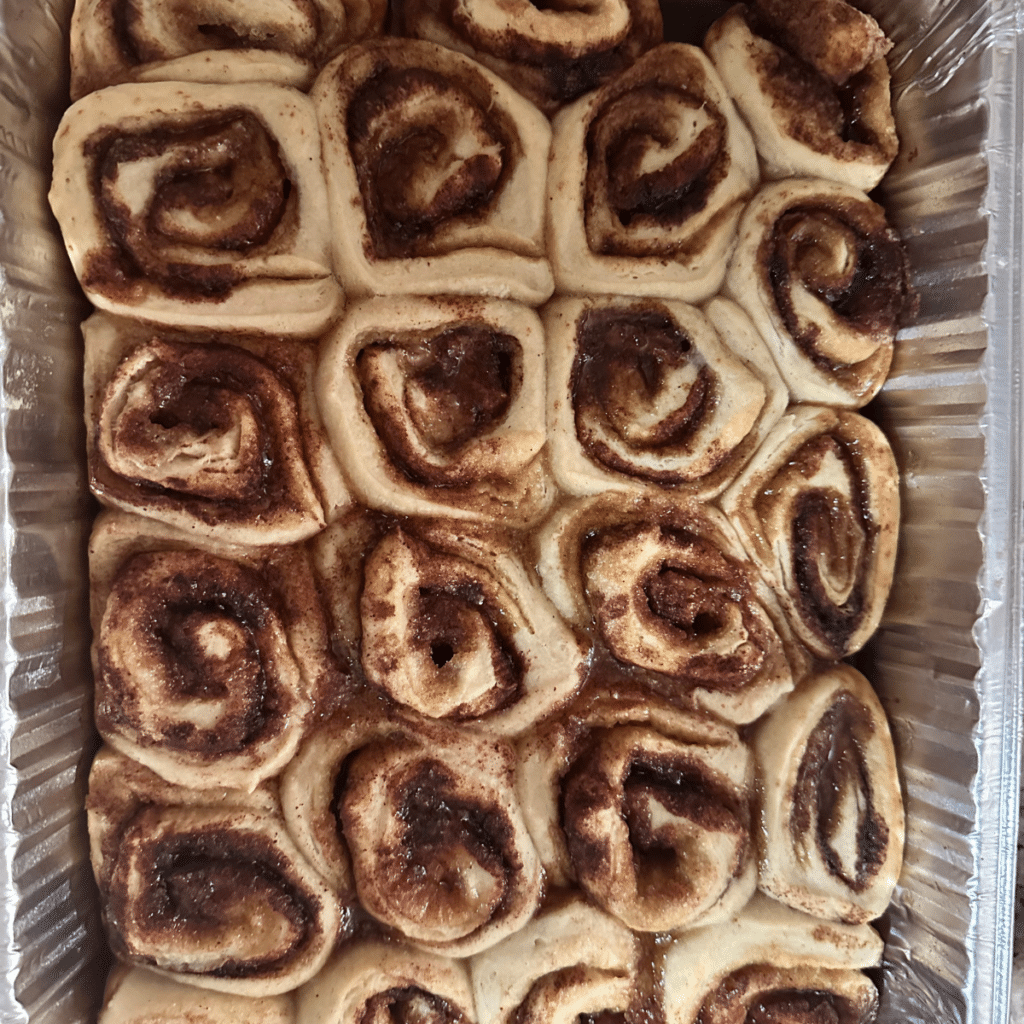 Mini Sourdough Cinnamon Rolls 5 Pan of mini sourdough cinnamon rolls without frosting after being baked