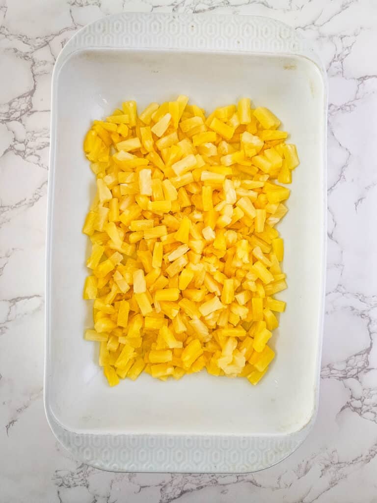 Pineapple Upside Down Dump Cake 4 pineapple tidbits in baking dish