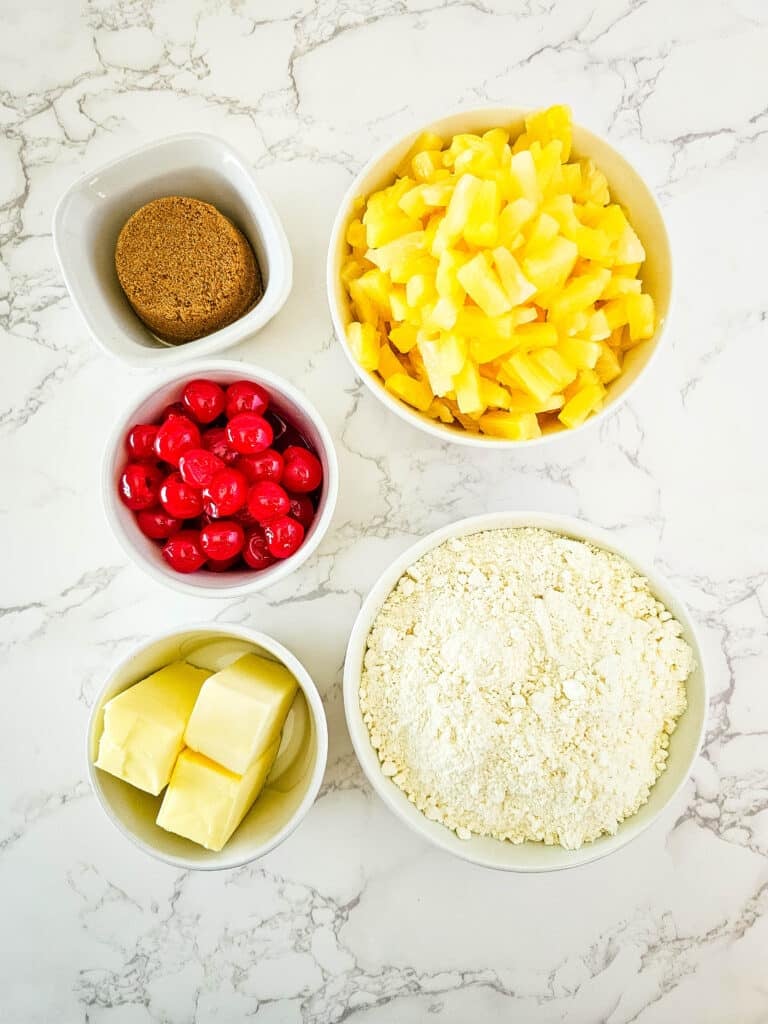 Pineapple Upside Down Dump Cake 3 Pineapple Upside Down Dump Cake ingredients in individual bowls