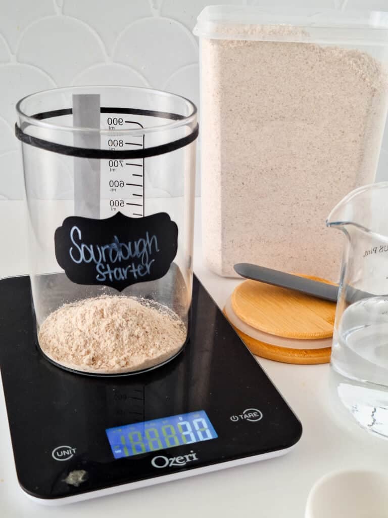 flour getting weighed on food scale