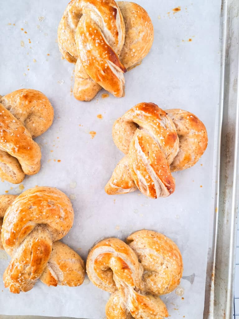 Sourdough Discard Pretzels 17 sourdough pretzels on parchment paper lined baking sheet