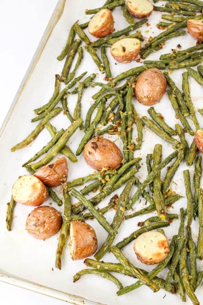 Leftover Roasted Potatoes and Green Beans 8 The finished Leftover Roasted Potatoes and Green Beans on a sheet tray lined with parchment paper.