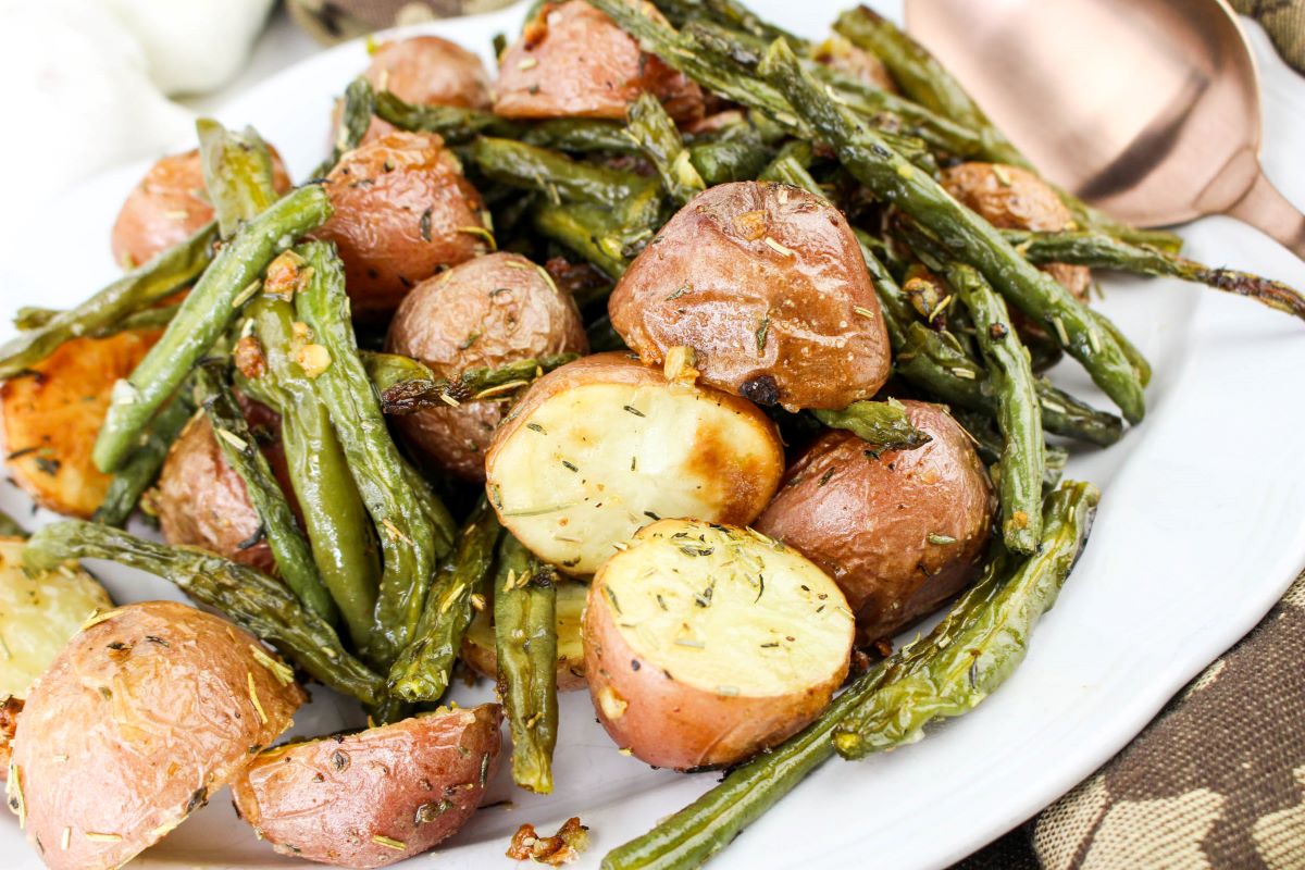 Closeup shot of the finished Leftover Roasted Potatoes and Green Beans in a platter.