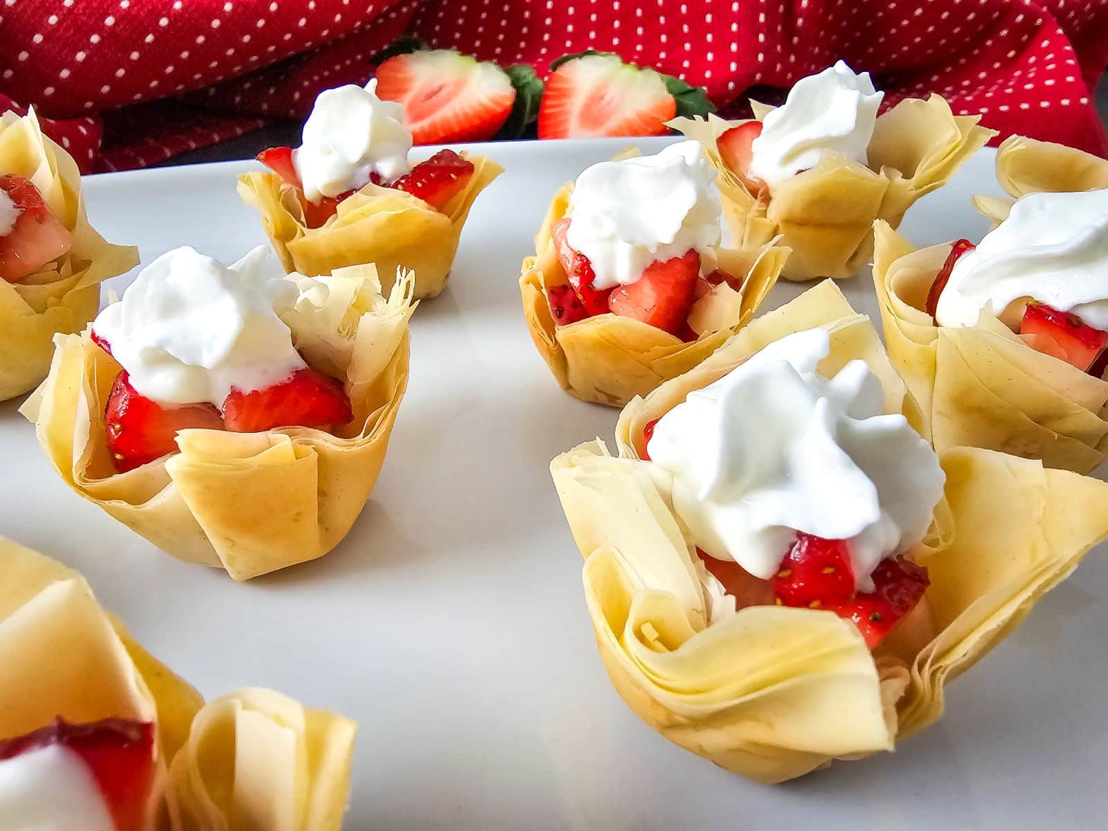 Closeup shot of the finished Mini Strawberry Shortcake Bites in a white platter.