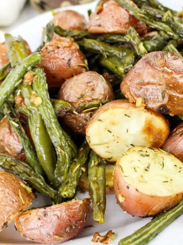 Closeup shot of the finished Leftover Roasted Potatoes and Green Beans in a platter.