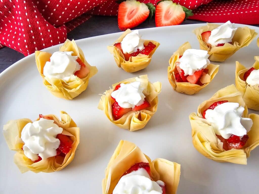 Closeup shot of the finished batch of Mini Strawberry Shortcake Bites in a platter.