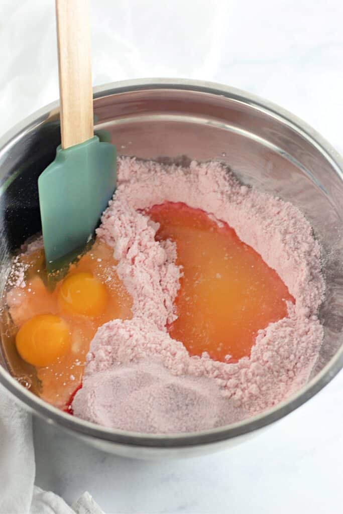 Strawberry Shortcake Crunch Bars with Box Cake Mix 8 High angle shot of ingredients in a stainless steel bowl.