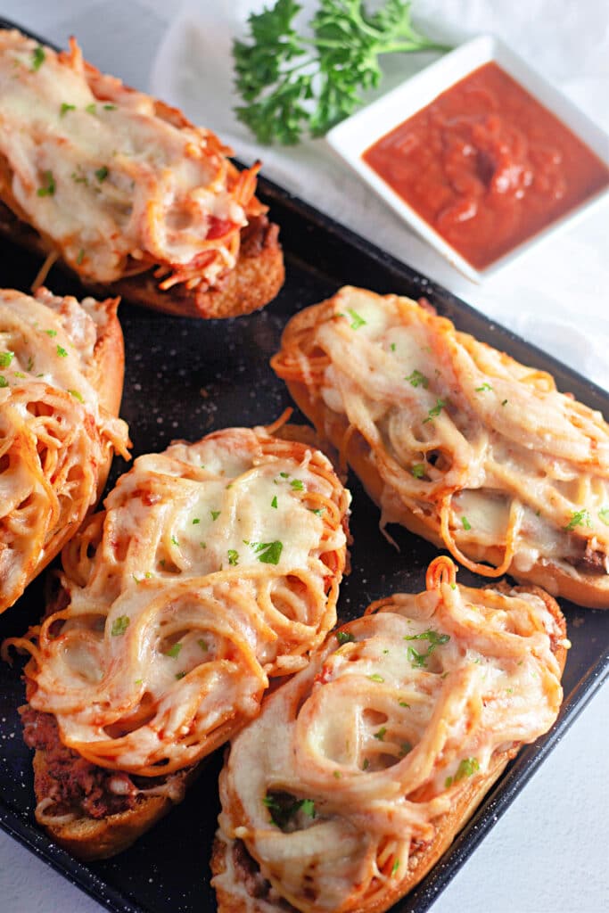 Venison Spaghetti Bread (A Family Favorite!) 24 Flat lay shot of a sheet tray with the batch of Venison Spaghetti Bread