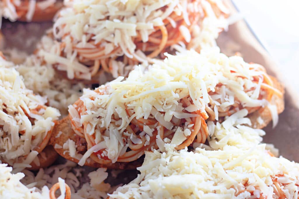 Venison Spaghetti Bread (A Family Favorite!) 23 Venison Spaghetti Breads topped with cheese.