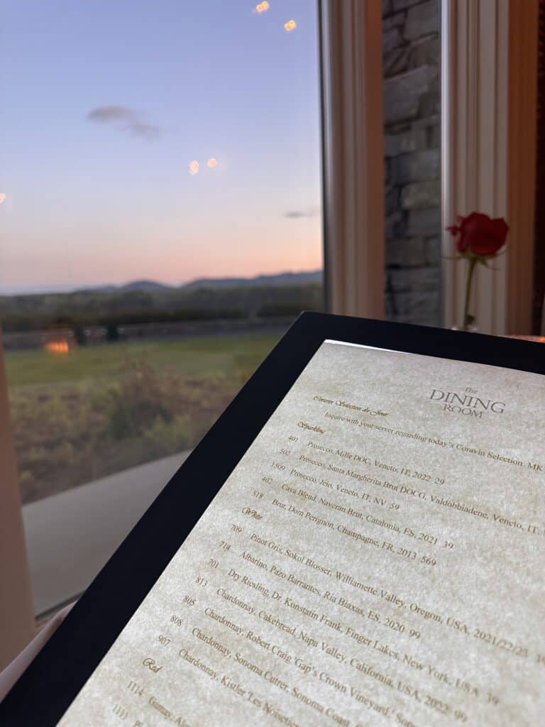 Honest Review: The Inn on Biltmore Estate in Asheville North Carolina 5 Menu at The Dining Room Biltmore with sunset view in background