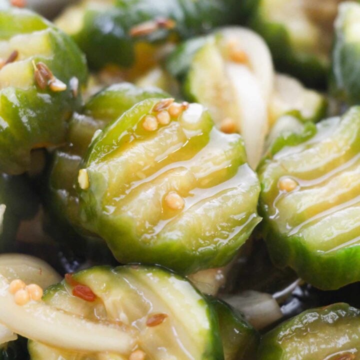 Closeup shot of a bowl of pickles.
